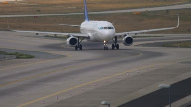 FRANKFURT AM MAIN, GERMANY - JULY 19, 2017: Airbus A320 of Air Astana taxiing on the airfield at Frankfurt Airport, Germany. Tourism and travel concept, air flight