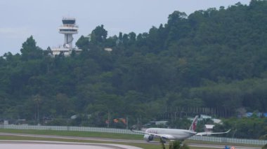 PHUKET, THAILAND - NOVEMBER 28, 2019: Qatar Airways Airbus A350 taxiing before departure from Phuket airport. Tourism and travel concept