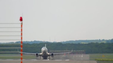 DUSSELDORF, GERMANY - JULY 23, 2017: Boeing 737 of SunExpress taking off overhead at Dusseldorf Airport