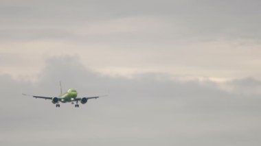 NOVOSIBIRSK, RUSSIAN FEDERATION - JULY 15, 2022: Airbus A320 of S7 Airlines landing at Tolmachevo airport. Footage of a passenger plane flies. Tourism and travel concept