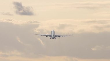 Civil jet plane takeoff, climb, rear view. Commercial aircraft flying away. Tourism and travel concept