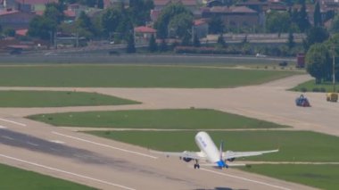 SOCHI, RUSSIA - JULY 28, 2022: Passenger plane Ural Airlines takeoff and climb. at Sochi International Airport. Tourism and travel concept.