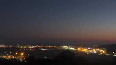 Generic international airport airfield night timelapse with moving lights from commercial jet airliners. Tourism and travel concept