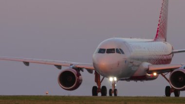 KAZAN, RUSSIA - AUGUST 05, 2022: Airbus A320 Rossiya Airlines departure at sunset in Kazan airport. Commercial passenger aircraft on the runway. Flight ready to take off