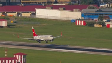 SOCHI, RUSSIA - JULY 29, 2022: Boeing 737 of Nordwind landing and braking at Sochi airport. Tourism and travel concept
