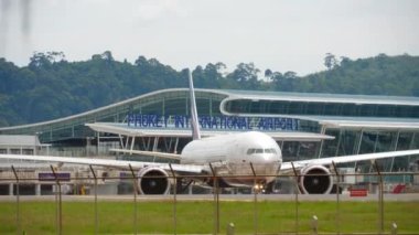 PHUKET, THAILAND - NOVEMBER 27, 2017: Boeing 777 of Aeroflot in front of Phuket airport terminal. Tourism and travel concept