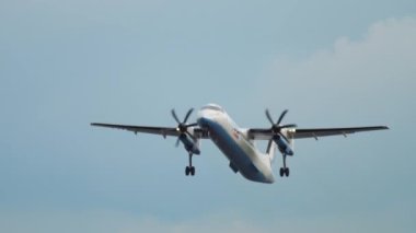 AMSTERDAM, THE NETHERLANDS - JULY 24, 2017: De Havilland Canada Dash 8-400, G-ECOR of FlyBe takeoff overhead at Schiphol Airport, Amsterdam. Tourism and travel concept
