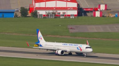 SOCHI, RUSSIA - JULY 29, 2022: Airbus A321-251NX, RA-73837 of Ural Airlines braking after landing at Sochi airport. Tourism and travel concept