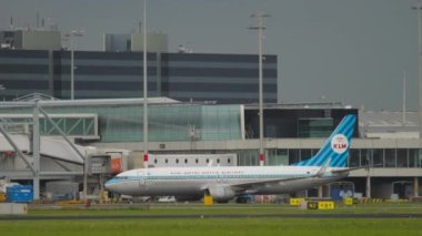AMSTERDAM, THE NETHERLANDS - JULY 27, 2017: Passenger aircraft of KLM Airlines Retro livery taxiing at Schiphol Airport, Amsterdam. Tourism and travel concept