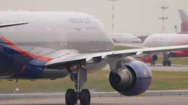 MOSCOW, RUSSIAN FEDERATION - JULY 28, 2021: Airbus A320 of Aeroflot taxiing at Sheremetyevo airport, medium shot. Tourism and travel concept