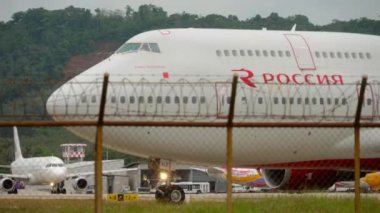 PHUKET, THAILAND - NOVEMBER 26, 2017: Boeing 747 of Rossiya on the taxiway at Phuket airport. Tourism and travel concept