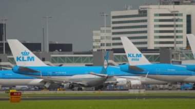 AMSTERDAM, THE NETHERLANDS - JULY 27, 2017: Passenger aircraft of KLM Airlines Retro livery taxiing at Schiphol Airport, Amsterdam. Tourism and travel concept