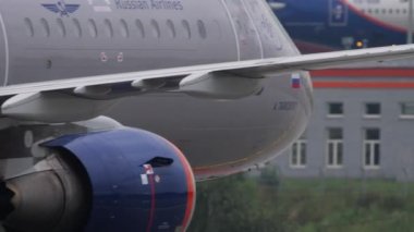 MOSCOW, RUSSIAN FEDERATION - JULY 28, 2021: Airplane of Aeroflot taxiing at Sheremetyevo Airport SVO. Tourism and travel concept. Aircraft closeup