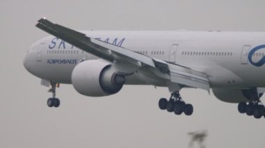 MOSCOW, RUSSIAN FEDERATION - JULY 28, 2021: Boeing 777 of Aeroflot with Skyteam livery landing at Sheremetyevo airport. Airliner touch and brake