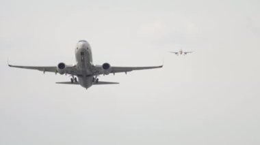 DUSSELDORF, GERMANY - JULY 23, 2017: Boeing 737, TC-SNG of SunExpress takeoff overhead at Dusseldorf Airport. Airplane departure, aviation concept background