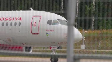 MOSCOW, RUSSIAN FEDERATION - JULY 28, 2021: Airplane of Rossiya taxiing at Sheremetyevo Airport SVO. Tourism and travel concept. Front of the aircraft, cockpit