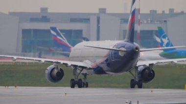 MOSCOW, RUSSIAN FEDERATION - JULY 28, 2021: Airplane of Aeroflot taxiing on the runway at Sheremetyevo Airport SVO. Tourism and travel concept. Aircraft on taxiway