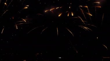 Incredible fireworks at the city festival in the night sky. Holiday concept. Celebrating New Year and Christmas