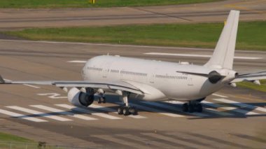 SOCHI, RUSSIA - JULY 30, 2022: Passenger airplane Airbus A330, RA-73688 of IFly Airlines taxiing at Sochi airport. I Fly Airlines Russian charter airline. Tourism and travel concept