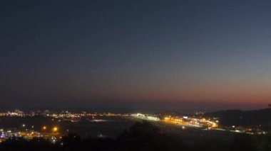 Airport timelapse with lights from moving airplanes landing taxiing and taking off at Sochi. Tourism and travel concept