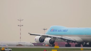 MOSCOW, RUSSIAN FEDERATION - JULY 28, 2021: Widebody aircraft boeing 747 Korean Air Cargo accelerate before departure at Sheremetyevo Airport, Moscow. Jumbo jet on the runway