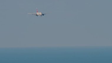 SOCHI, RUSSIA - JULY 29, 2022: Airplane Boeing 737 of Nordwind approaching before landing at Sochi airport. Tourism and travel concept