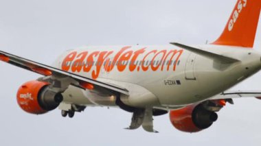 AMSTERDAM, THE NETHERLANDS - JULY 26, 2017: Airbus A319-111, G-EZAA of EasyJet departure at Schiphol Airport, Amsterdam. Tourism and travel concept