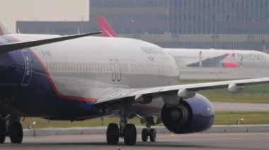 MOSCOW, RUSSIAN FEDERATION - JULY 28, 2021: Middle shot, Boeing 737 of Aeroflot Russian Airlines taxiing on the runway at Sheremetyevo airport SVO. Tourism and travel concept