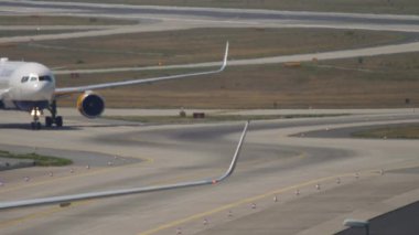 FRANKFURT AM MAIN, GERMANY - JULY 19, 2017: Passenger plane Boeing 767 of Icelandair taxiing at Frankfurt, Germany. Icelandic airline. Tourism and travel concept, air flight