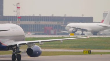 MOSCOW, RUSSIAN FEDERATION - JULY 28, 2021: Airplane of Aeroflot taxiing at Sheremetyevo airport. Civil aircraft on the taxiway. Tourism and travel concept