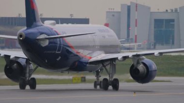 MOSCOW, RUSSIAN FEDERATION - JULY 28, 2021: Airbus A320 of Aeroflot taxiing on the runway at Sheremetyevo Airport. Tourism and travel concept