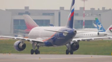 MOSCOW, RUSSIAN FEDERATION - JULY 28, 2021: Passenger jet plane Airbus A320 of Aeroflot taxiing at Sheremetyevo airport. Civil aircraft on the taxiway. Tourism and travel concept
