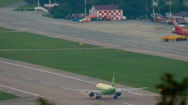 SOCHI, RUSSIA - JULY 30, 2022: Passenger aircraft of S7 Airlines departure at Sochi airport. Airplane takeoff. Tourism and travel concept