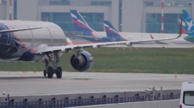 MOSCOW, RUSSIAN FEDERATION - JULY 28, 2021: Aeroflot passenger flight on the taxiway of the Sheremetyevo airport. Airliner ready to take off