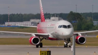 MOSCOW, RUSSIAN FEDERATION - JULY 29, 2021: Passenger carrier Superjet 100 of Russia taxiing to Sheremetyevo airport, Moscow