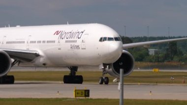 MOSCOW, RUSSIAN FEDERATION - JULY 29, 2021: Aircraft of Nordwind airlines taxiing at Sheremetyevo airport, Moscow SVO. Airplane on the airfield. Tourism and travel concept.