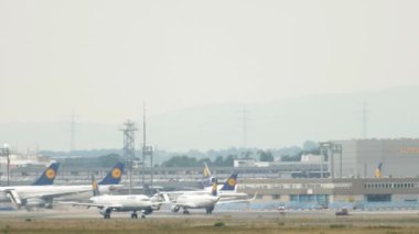 FRANKFURT AM MAIN, GERMANY - JULY 17, 2017: Lufthansa Airbus A321 take-off at runway 07C. Side view, passenger plane departure and climb. Fraport, Frankfurt, Germany
