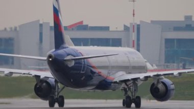 MOSCOW, RUSSIAN FEDERATION - JULY 28, 2021: Aircraft of Aeroflot rides to runway, departing flight at Sheremetyevo airport. Tourism and aviation concept