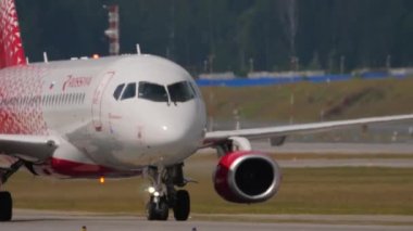 MOSCOW, RUSSIAN FEDERATION - JULY 29, 2021: Passenger aircraft of Rossiya taxiing to Sheremetyevo airport, Moscow. View of the cockpit of the aircraft. Tourism and travel concept
