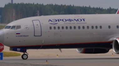 MOSCOW, RUSSIAN FEDERATION - JULY 29, 2021: Boeing 737 of Aeroflot taxiing on the runway at Sheremetyevo Airport. Tourism and travel concept