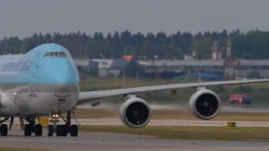 MOSCOW, RUSSIAN FEDERATION - JULY 29, 2021: Middle shot, Boeing 747 of Korean Air Cargo taxiing at Sheremetyevo Airport, Moscow. Jumbo jet on the taxiway, front view