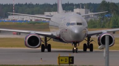 MOSCOW, RUSSIAN FEDERATION - JULY 29, 2021: Mid shot, Boeing 737 of Aeroflot on the taxiway of Sheremetyevo Airport. Tourism and travel concept