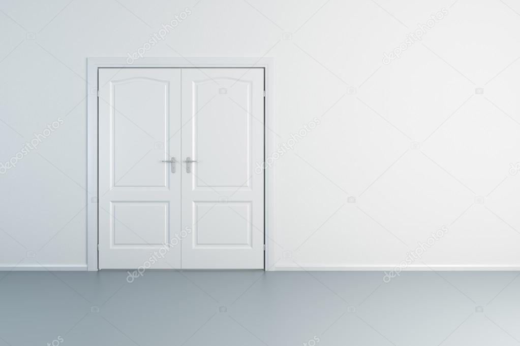empty white room with closed door