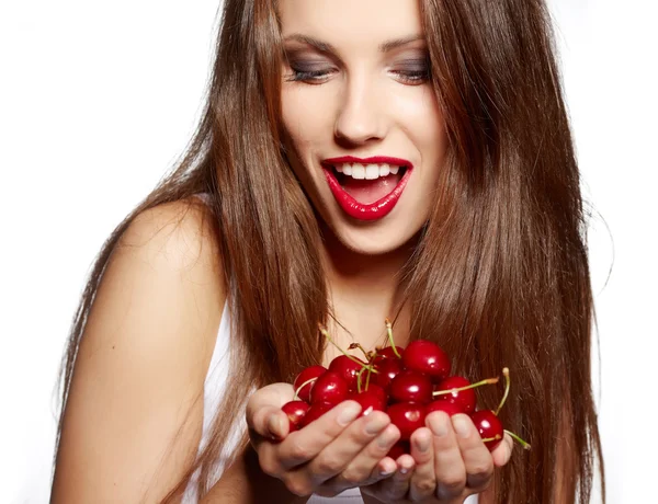 Happy woman with cherries over white — Stock Photo, Image