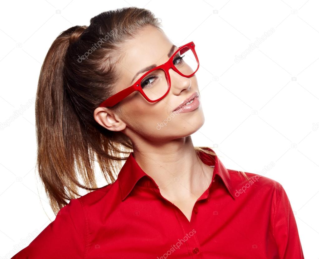 Portrait of a beautiful young woman wearing glasses