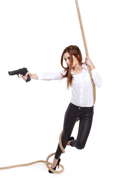 Sexy girl holding a black gun — Stock Photo, Image