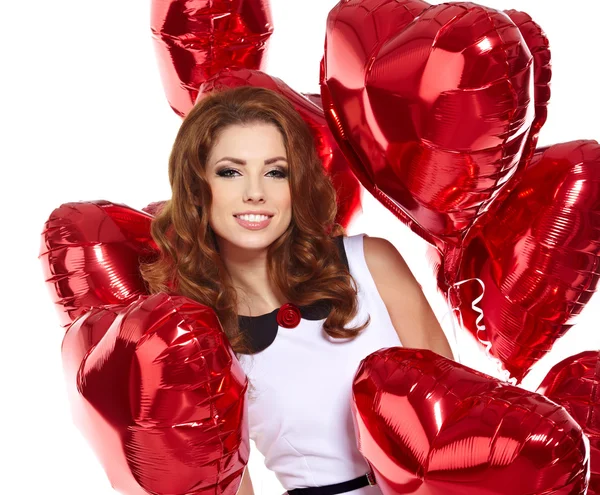 Woman with red heart balloon Royalty Free Stock Images