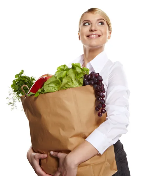 Retrato de mujer de negocios feliz sosteniendo una bolsa llena de — Foto de Stock