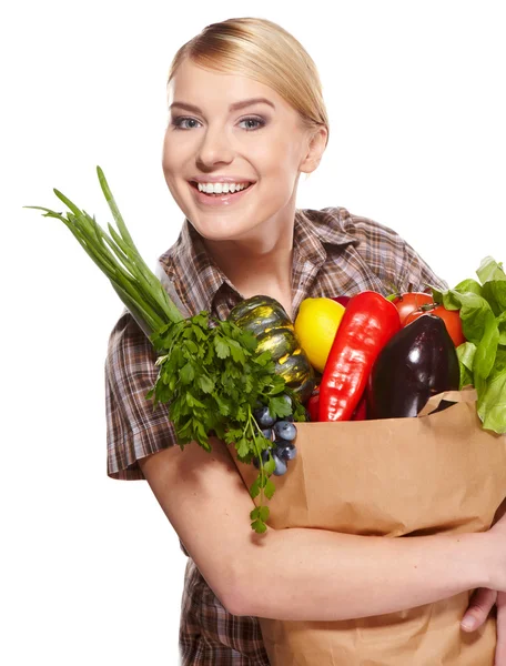 Mulher segurando um saco cheio de comida saudável. compras  . — Fotografia de Stock