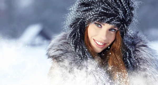 Young woman winter portrait. Shallow dof. Stock Picture